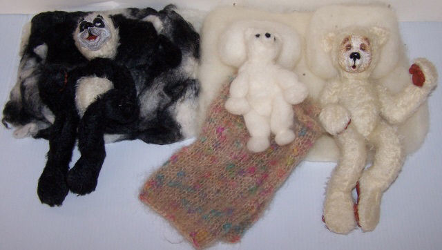*2 BEARLY HUMAN DESIGNER BEARS: Panda and polar bear by Susan McMullen and Bonnie Duchscherer, fully jointed, approximate height 11 1/2".