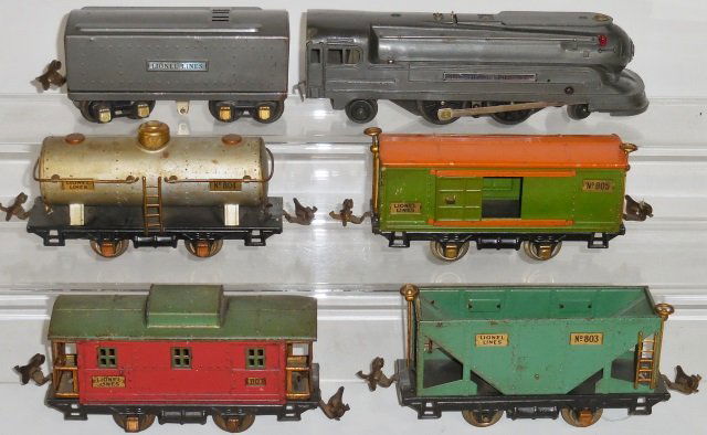 *LIONEL O GAUGE TRAIN SET: #1688 steam locomotive and whistle tender, #804 tank car, #805 boxcar, #803 hopper and #807 caboose.