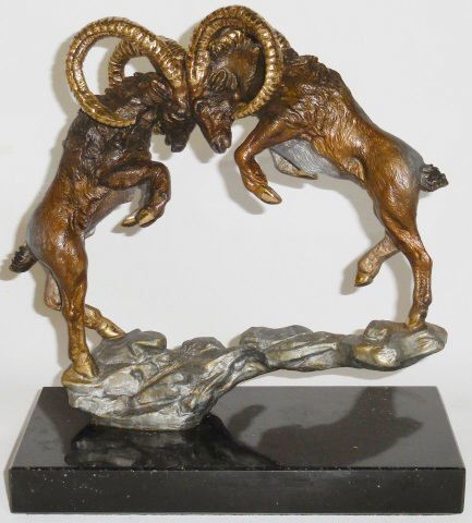 MORALES, R.: Head-butting rams, bronze sculpture on marble base, stamped "Carus 1985", #237/1200, approximate height with base 10".
