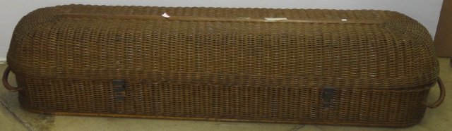 *WICKER REMOVAL BASKET/CASKET: (Circa 1900) Frigid Fluid Co. Chicago, adult size having original horse hair filled pillow and straps, tag on lid (used to transport deceased from place of death to funeral home).