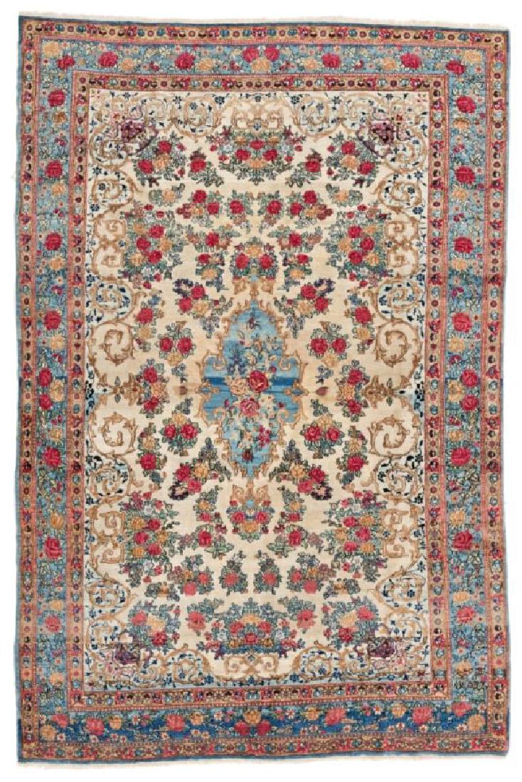 Kirman 209 x 135 cm (6ft. 10in. X 4ft. 5in.) Persia,: Kirman 209 x 135 cm (6ft. 10in. X 4ft. 5in.) Persia, early 20th century Condition: good, few small repairs in the center Warp: cotton, weft: cotton, pile: wool