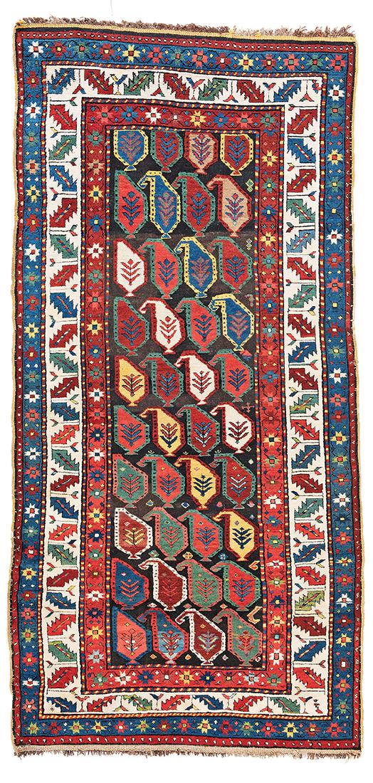 Karabagh: 7 ft. 5 in. x 3 ft. 7 in. Caucasus, late 19th century Condition: good, brown partly corroded, few small repairs and reweavings Warp: wool, weft: wool, pile: wool Provenance: Theo Häberli private 