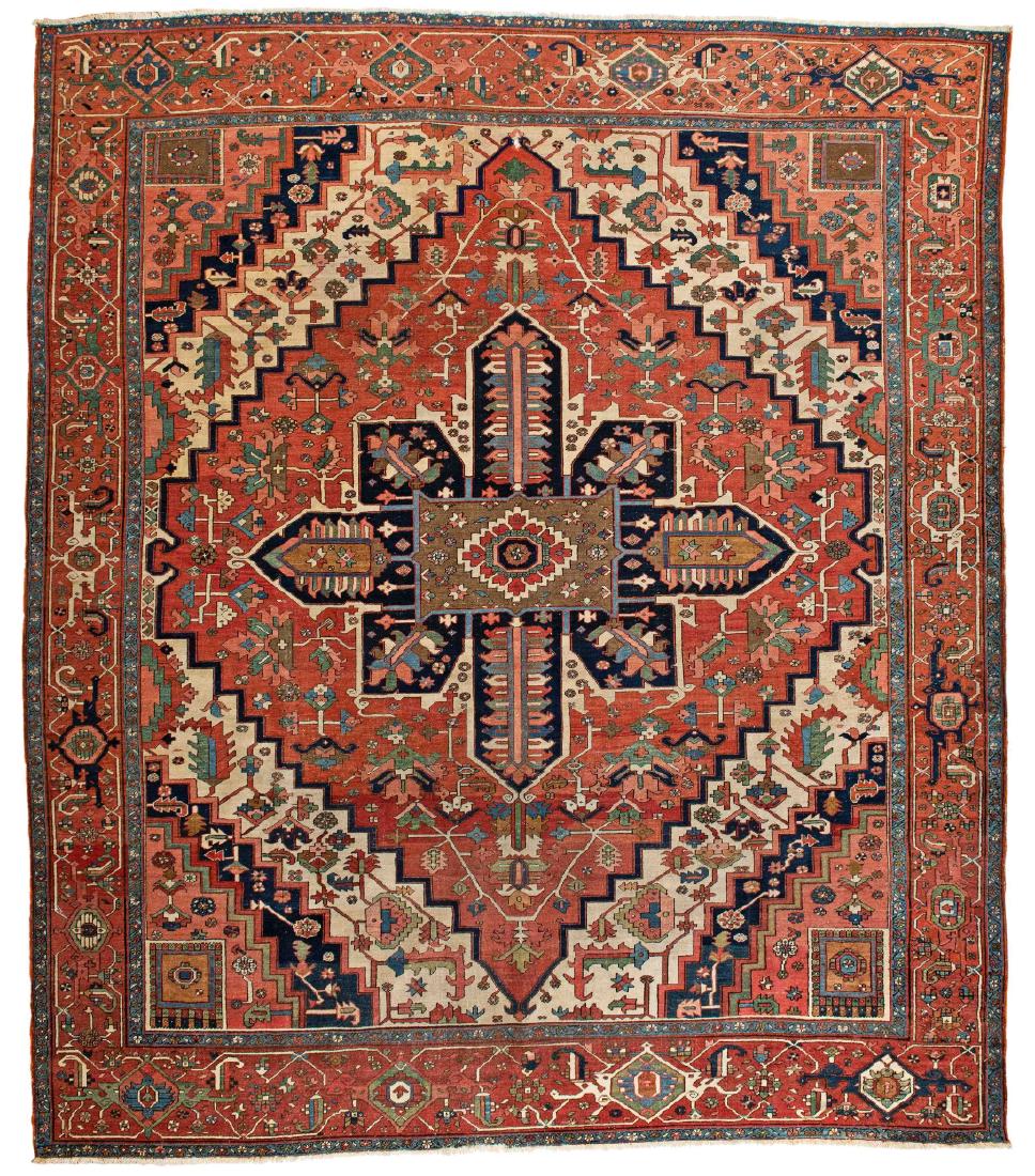 Heriz: Heriz 375 x 330 cm (12 ft. 4 in. x 10 ft. 10 in.) Persia, ca. 1900 Condition: good, low pile, either ends slightly incomplete, one hole in the bottom center, some old repairs Warp: cotton, weft: cotto