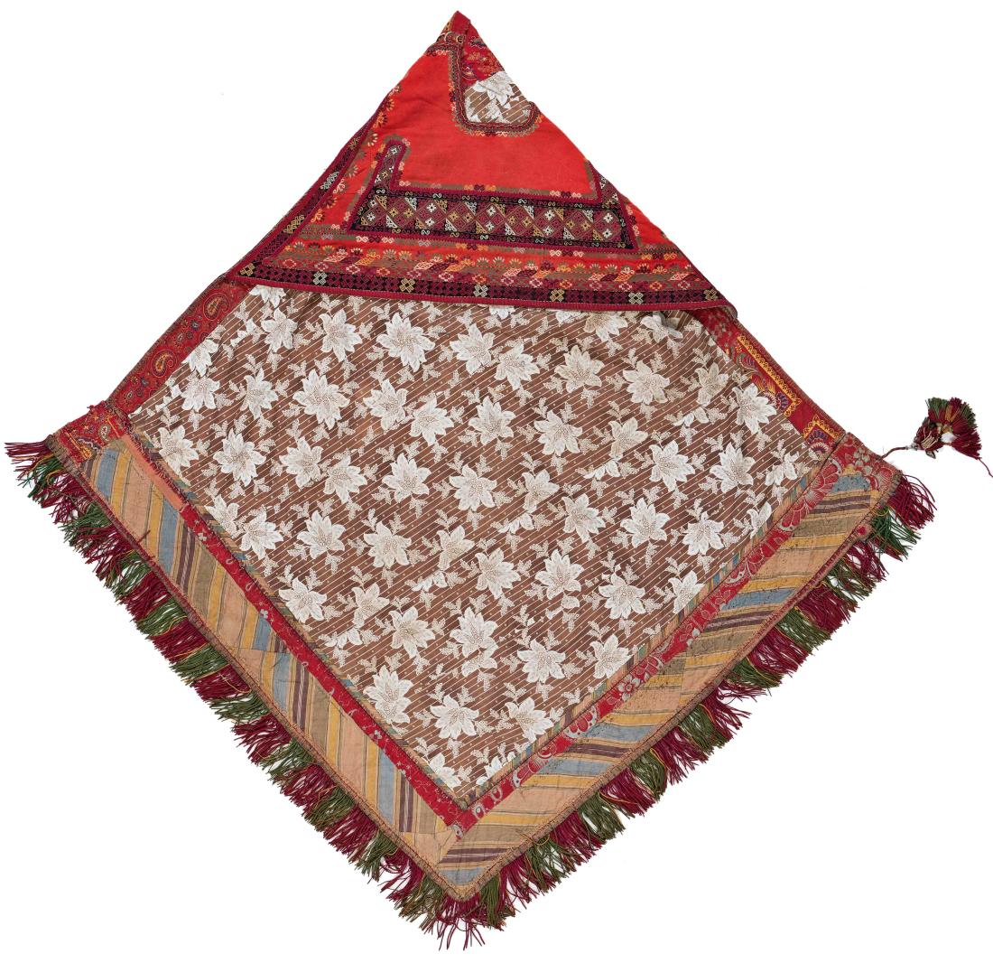 Turkmenian Cloak with Ikat: Turkmenian Cloak with Ikat 145 x 140 cm (4 ft. 9 in. x 4 ft. 7 in.) Turkmenistan, ca. 1900 Condition: used, embroidery well preserved, Ikat damaged with splits and signs of wear Provenance: Italian pr