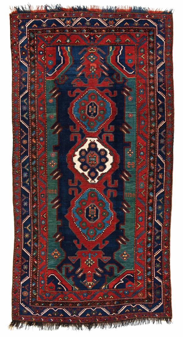 Karabagh *: Karabagh 337 x 173 cm (11 ft. 1 in. x 5 ft. 8 in.) Armenia, dated 1930 Condition: good, one repair in the upper center, slightly stained Warp: wool, weft: wool, pile: wool Provenance: Wormser collecti
