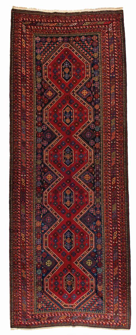 Shirvan *: Shirvan 443 x 166 cm (14 ft. 6 in. x 5 ft. 5 in.) Caucasus, ca. 1900 Condition: good, few old small repairs Warp: wool, weft: wool, pile: wool Provenance: Wormser collection, Germany Normal taxation (