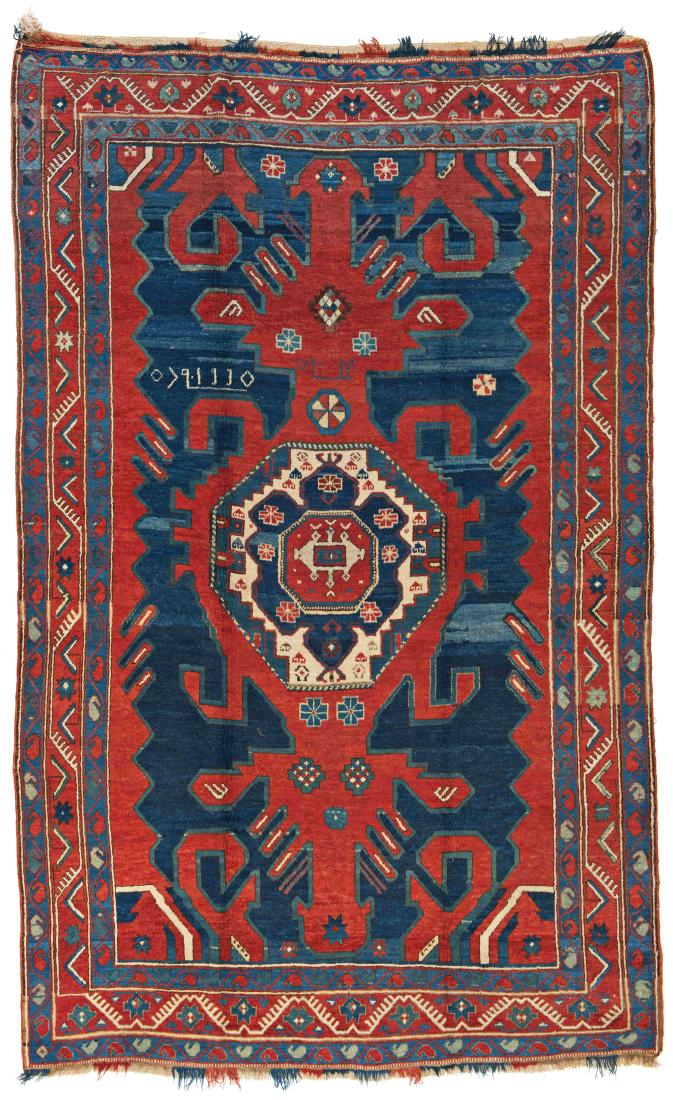 Karabagh *: Karabagh 270 x 170 cm (8 ft. 10 in. x 5 ft. 7 in.) Caucasus, dated 1930 Condition: good, one small crease in the bottom border, scattered low pile, few signs of wear Warp: wool, weft: wool, pile: wool