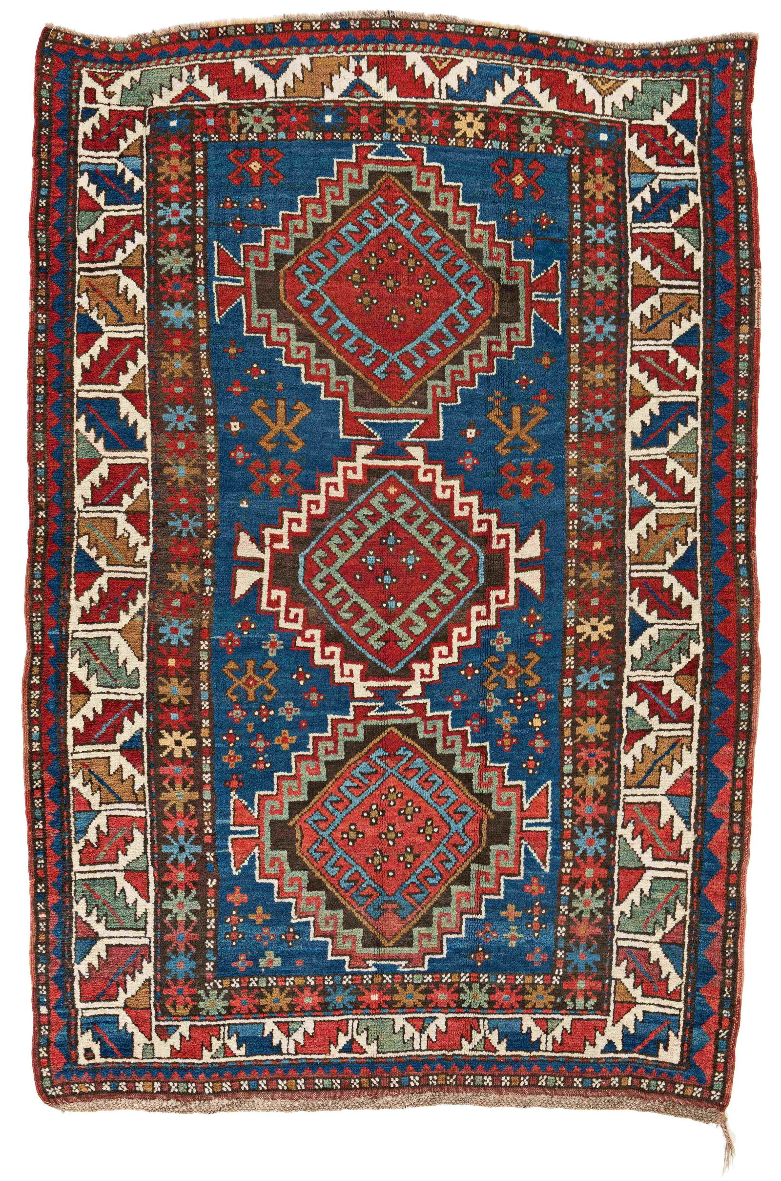 Kazak *: Kazak * 195 x 132 cm (6' 5" x 4' 4") Caucasus, early 20th century Condition: good, few old small repairs Warp: wool, weft: wool, pile: wool Normal taxation (marked *): 21% of the hammer price plus 20%