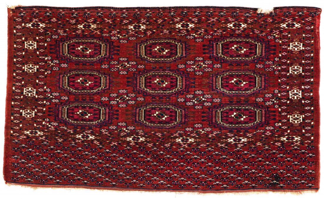 Tekke Chuval: Tekke Chuval 132 x 78 cm (4' 4" x 2' 7") Turkmenistan, second half 19th century Condition: good, low pile in places, left upper corner damaged, one hole at upper right, scattered small repairs Warp: w