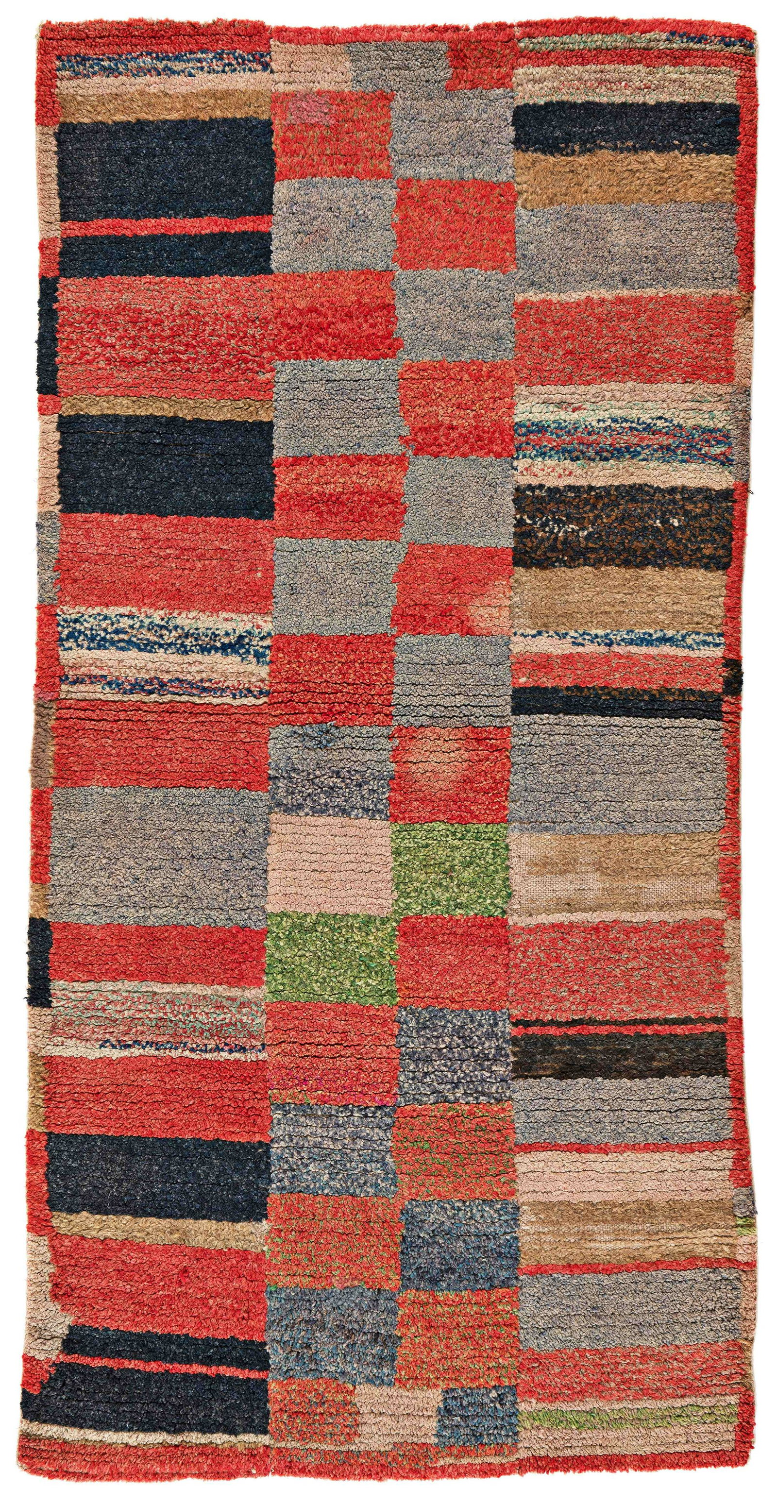 Tsuk Truk Rug: Tsuk Truk 154 x 75 cm (5' 1" x 2' 6") Tibet, early 20th century Condition: good, low pile in places, scattered small repairs, slight signs of use Warp: wool, weft: wool, pile: wool
