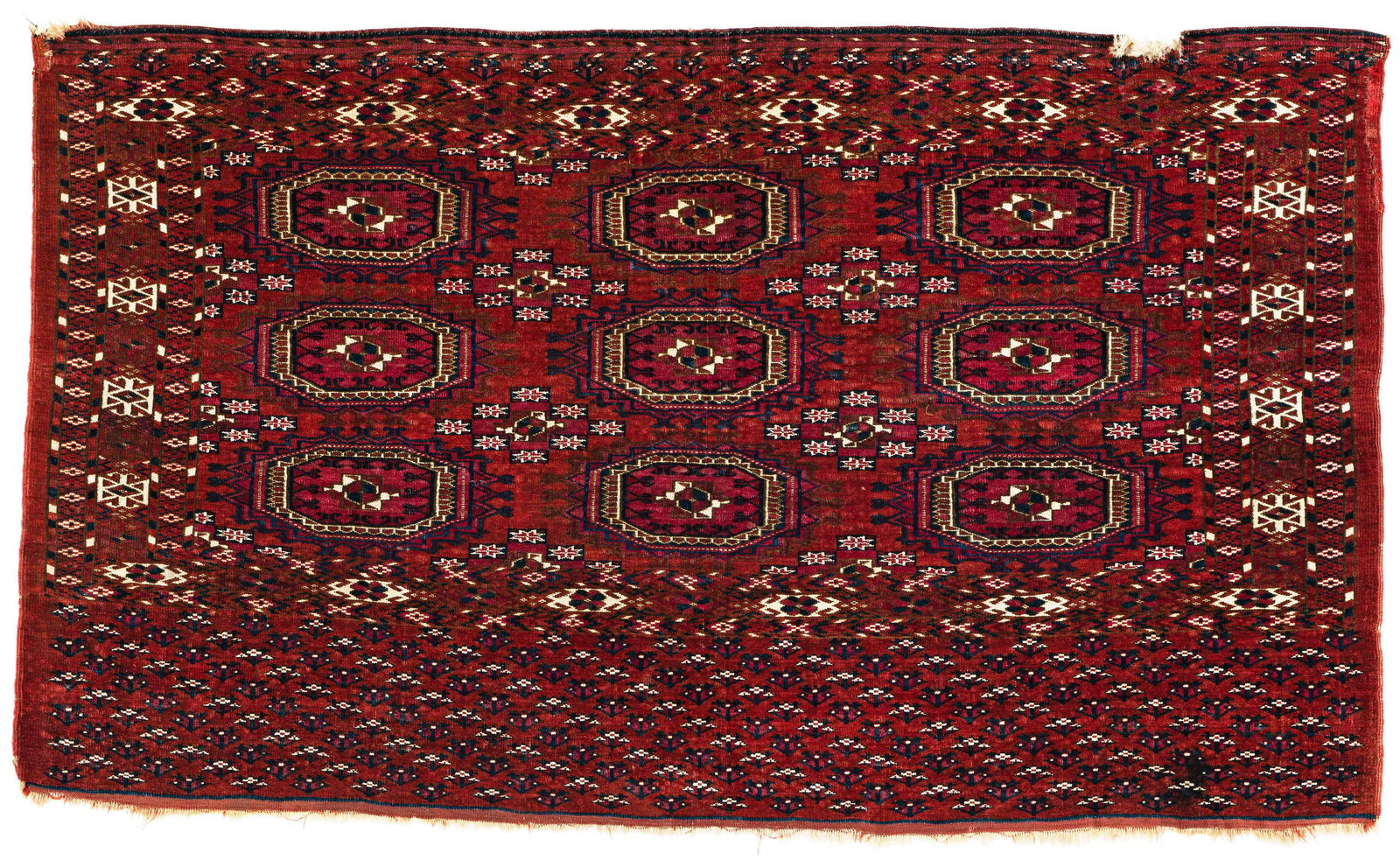 Tekke Chuval: Tekke Chuval 132 x 78 cm (4' 4" x 2' 7") Turkmenistan, second half 19th century Condition: good, low pile in places, left upper corner damaged, one hole at upper right, scattered small repairs Warp: w