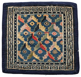 Tibet Sitting Rug: Tibet Sitting Rug 67 x 71 cm (2' 2" x 2' 4") Tibet, early 20th century Condition: good, good pile, signs of use at the selvages, edged and backed with fabric Warp: wool, weft: wool, pile: wool