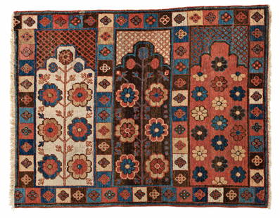 Khotan Saph Rug Fragment: Khotan Saph Fragment 125 x 98 cm (4' 1" x 3' 3") East Turkestan, early 19th century Condition: fragment, left side incomplete, low pile in places, scattered small repairs, selvages rebound Warp: