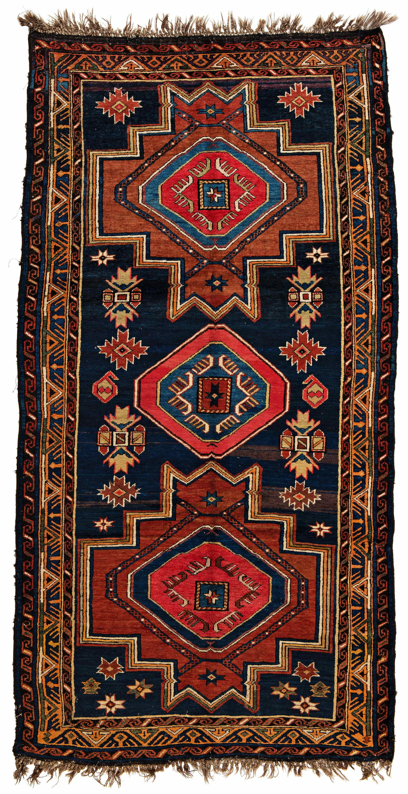 Karabagh Rug: Karabagh 248 x 130 cm (8' 2" x 4' 3") Armenia, ca. 1900 Condition: good, mostly good pile, several repairs, signs of use at sides and ends Warp: wool, weft: wool, pile: wool