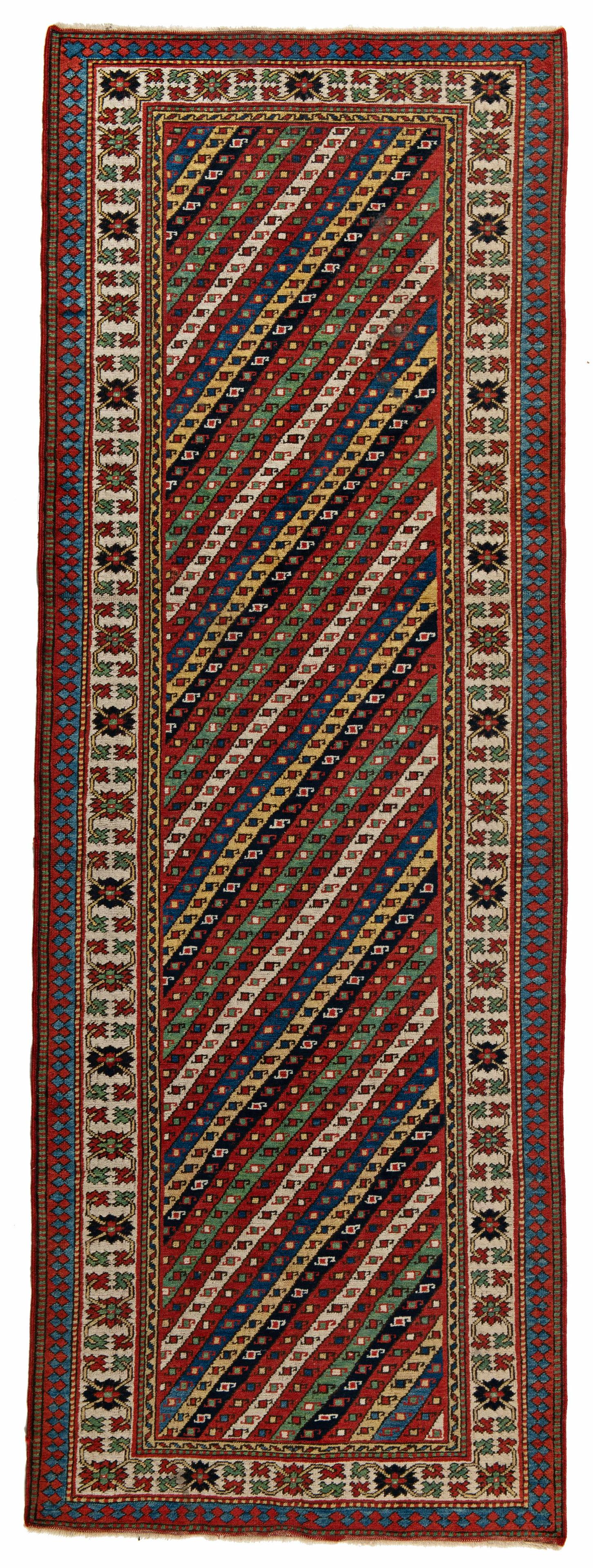 Replica of a Gendje Rug: Replica of a Gendje 272 x 97 cm (8' 11" x 3' 2") Turkey, second half 20th century Condition: good, low pile in places, slightly stained, minor signs of use Warp: wool, weft: wool, pile: wool