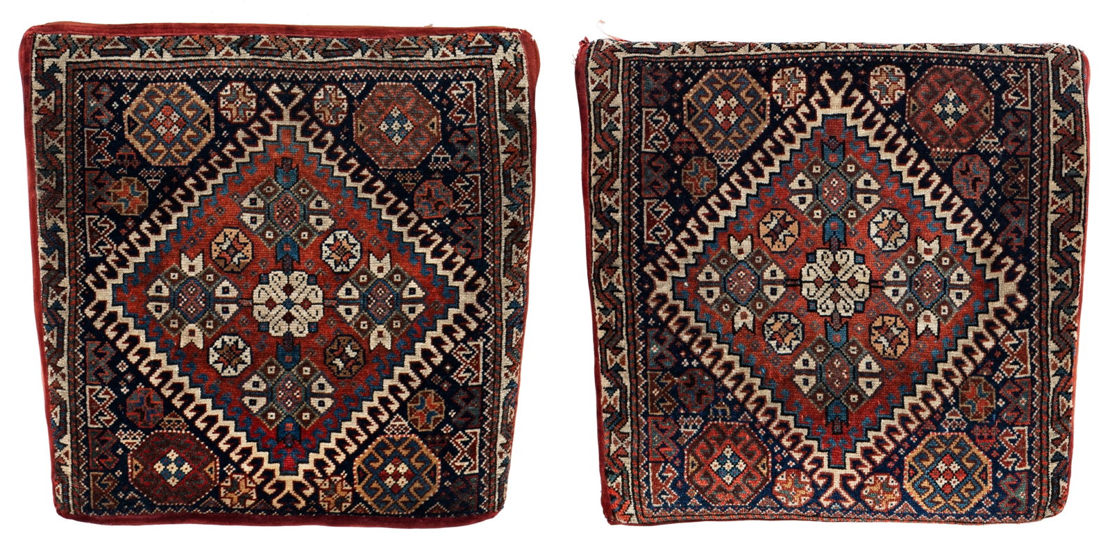 One pair of Qashqai Pillows: One pair of Qashqai Pillows 50 x 50 cm (1' 8" x 1' 8") each Persia, late 19th century Condition: as far as visible good, low pile in places Warp: wool, weft: wool, pile: wool