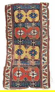 Early East Anatolian Kurdish Rug: 230 x 120 cm (7' 7" x 3' 11") Turkey, first half 19th century Condition: used, low pile, corroded dark brown, incomplete all around, scattered small repairs Warp: wool, weft: wool, pile: wool