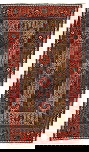 Baluch Rug: 186 x 108 cm (6' 1" x 3' 7") Persia, early 20th century Condition: good, mostly good pile, corroded dark brown, minor small repairs, both ends slightly incomplete, selvages rebound Warp: wool, weft: w