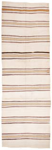 Central Anatolian Nomad Kilim: 436 x 146 cm (14' 4" x 4' 9") Turkey, ca. 1950 Condition: good, scattered small repairs, slightly stained Warp: wool, weft: wool