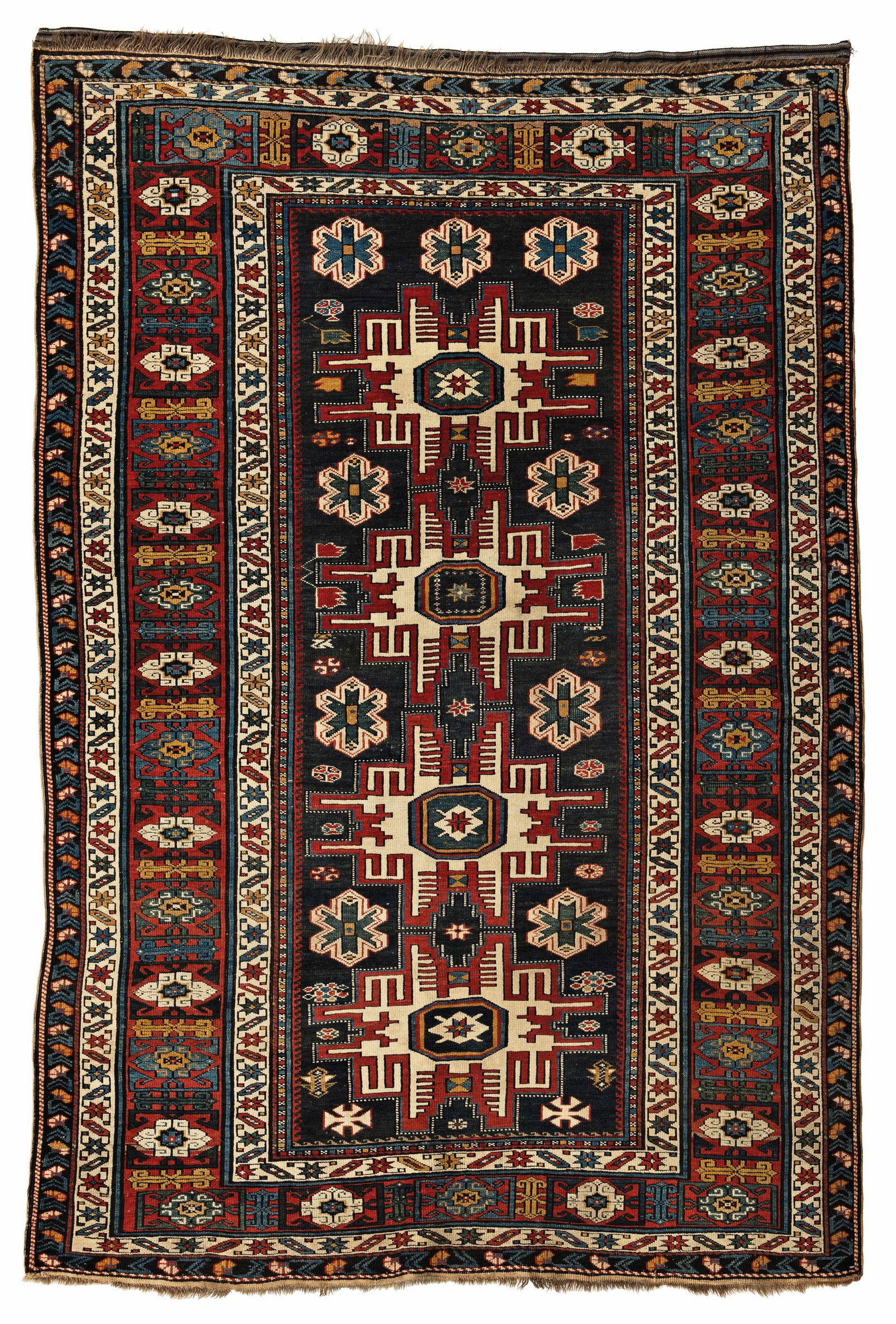 Kuba Rug: 178 x 121 cm (5' 10" x 4') Caucasus, late 19th century Condition: good, scattered low pile, scattered small repairs Warp: wool, weft: wool, pile: wool