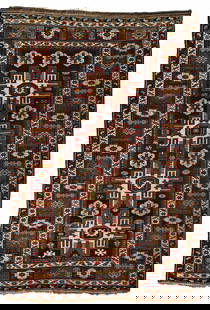 Kuba Rug: 178 x 121 cm (5' 10" x 4') Caucasus, late 19th century Condition: good, scattered low pile, scattered small repairs Warp: wool, weft: wool, pile: wool