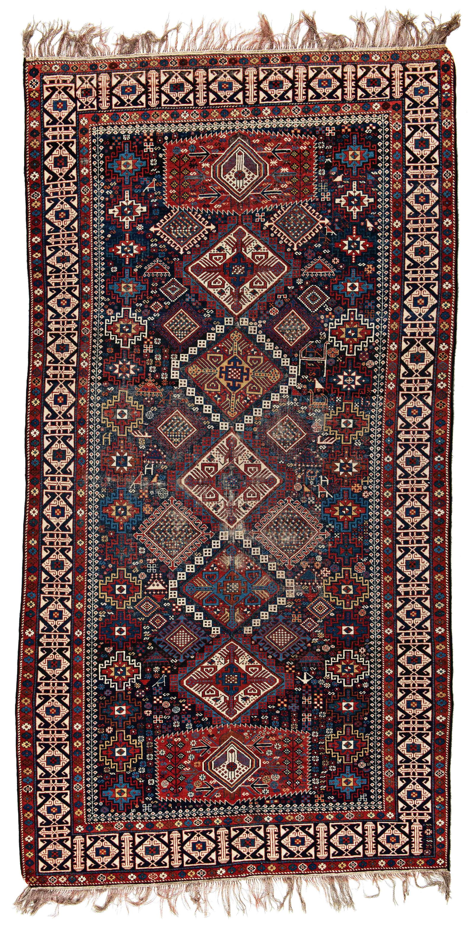 Shirvan Rug: 305 x 158 cm (10' x 5' 2") Caucasus, late 19th century Condition: used, low pile in places, foundation partially visible, scattered small repairs, selvages rebound Warp: wool, weft: cotton, pile: wool