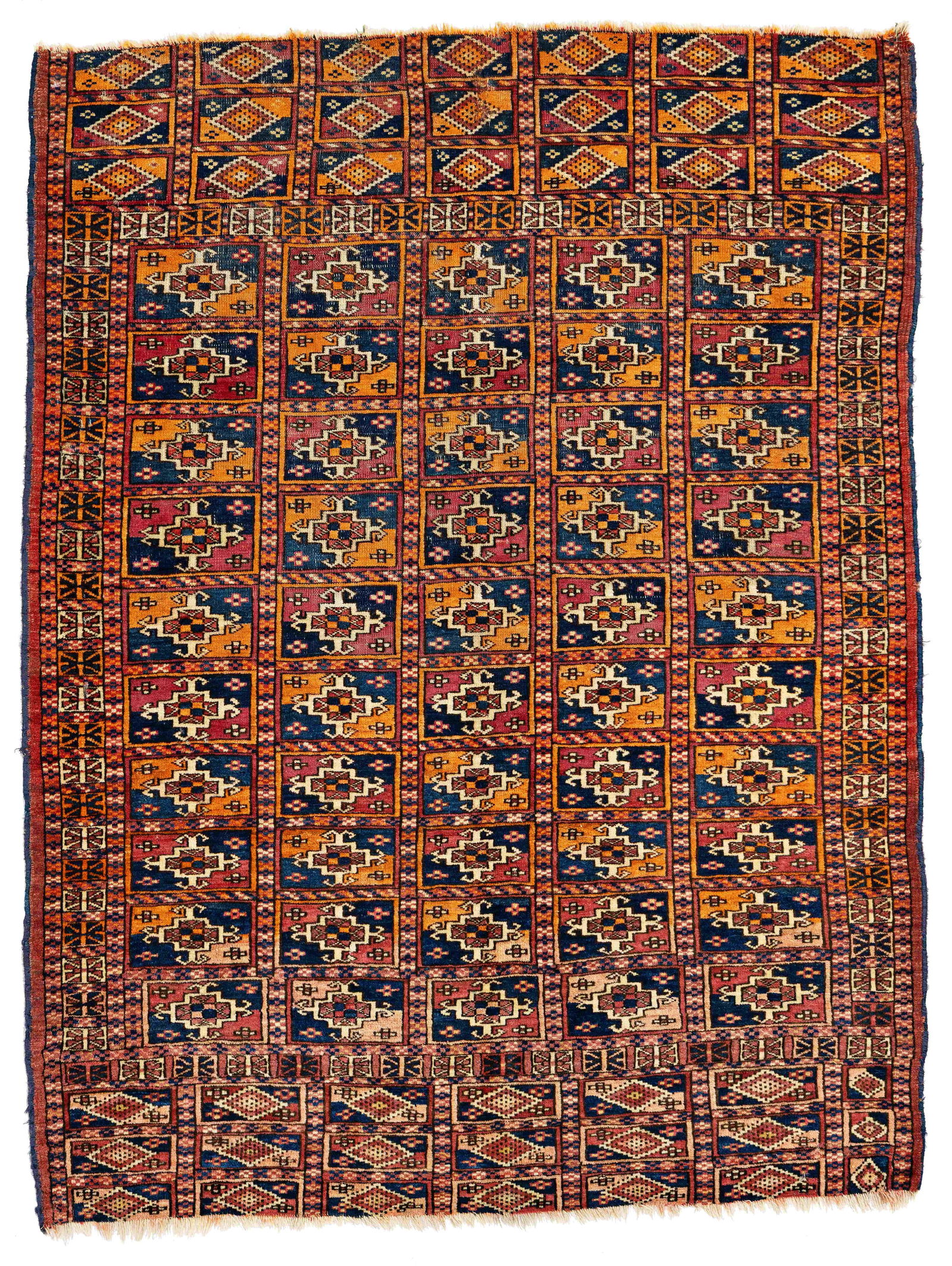 Tekke Rug: Tekke 133 x 100 cm (4' 4" x 3' 3") Turkmenistan, early 20th century Condition: good, low pile, both ends incomplete, scattered small old repairs, signs of use Warp: wool, weft: wool, pile: wool