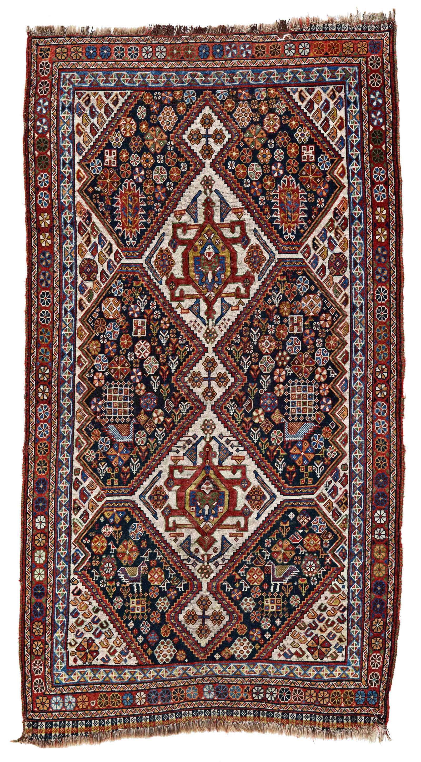 Qashqai Rug: Qashqai 192 x 106 cm (6' 4" x 3' 6") Persia, ca. 1900 Condition: good, low pile, upper end incomplete, lower end partially incomplete, selvages partially damaged, scattered small repairs Warp: wool, w