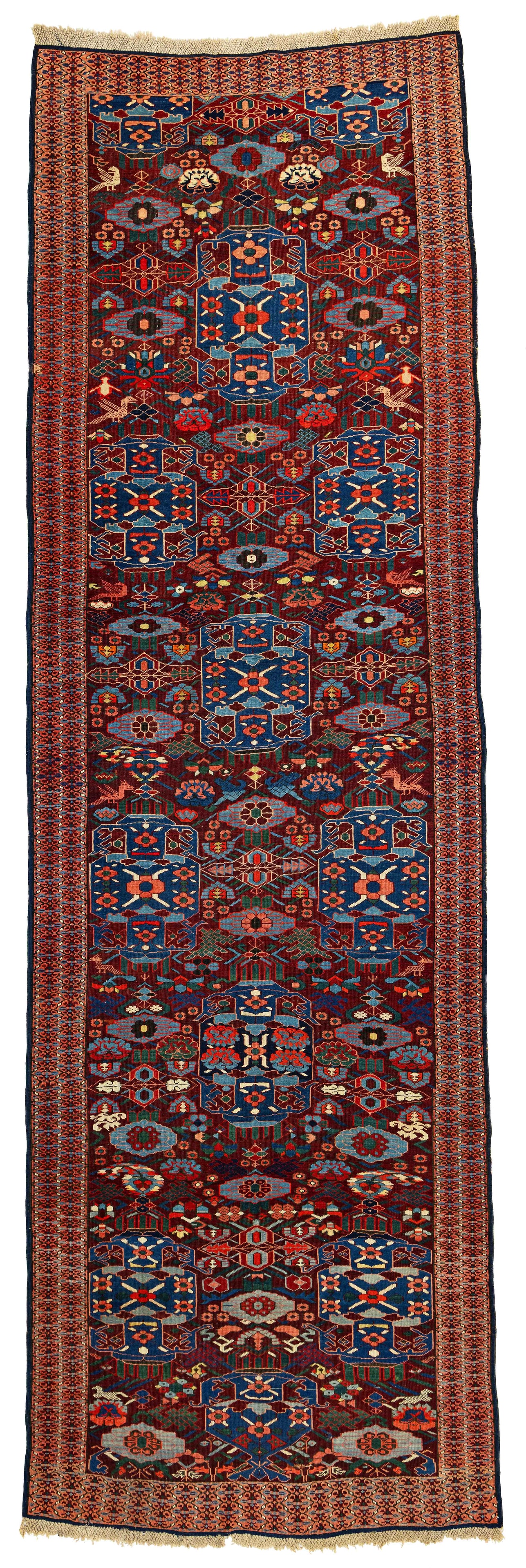 Kuba Rug: Kuba 404 x 125 cm (13' 3" x 4' 1") Caucasus, ca. 1900 Condition: good, low pile in places, scattered small repairs, signs of use Warp: wool, weft: wool, pile: wool