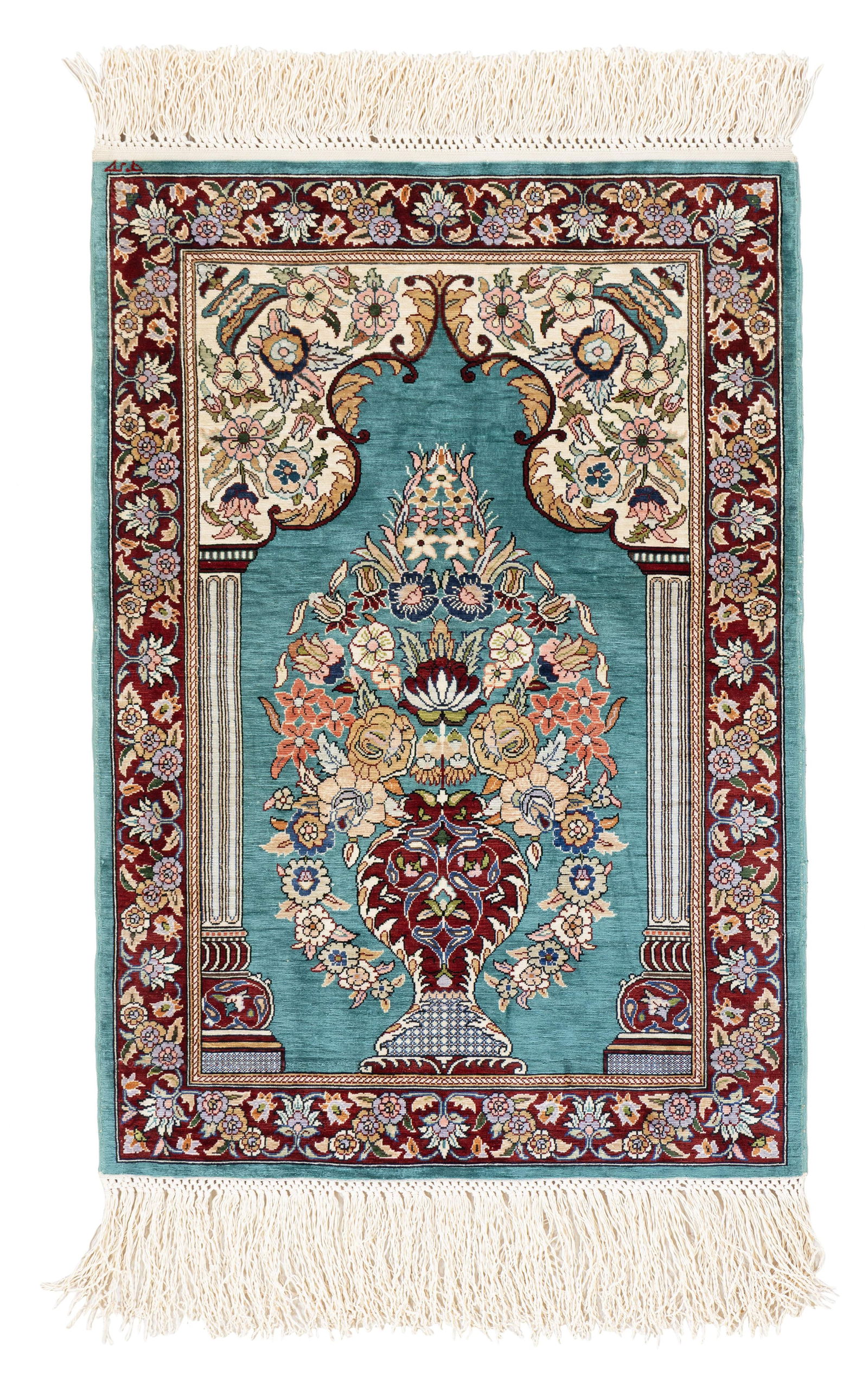 Signed Silk Hereke Rug (12 x 12 knots per sq cm): Signed Silk Hereke (12 x 12 knots per sq cm) 59 x 41 cm (1' 11" x 1' 4") Turkey, late 20th century Condition: excellent Warp: silk, weft: silk, pile: silk