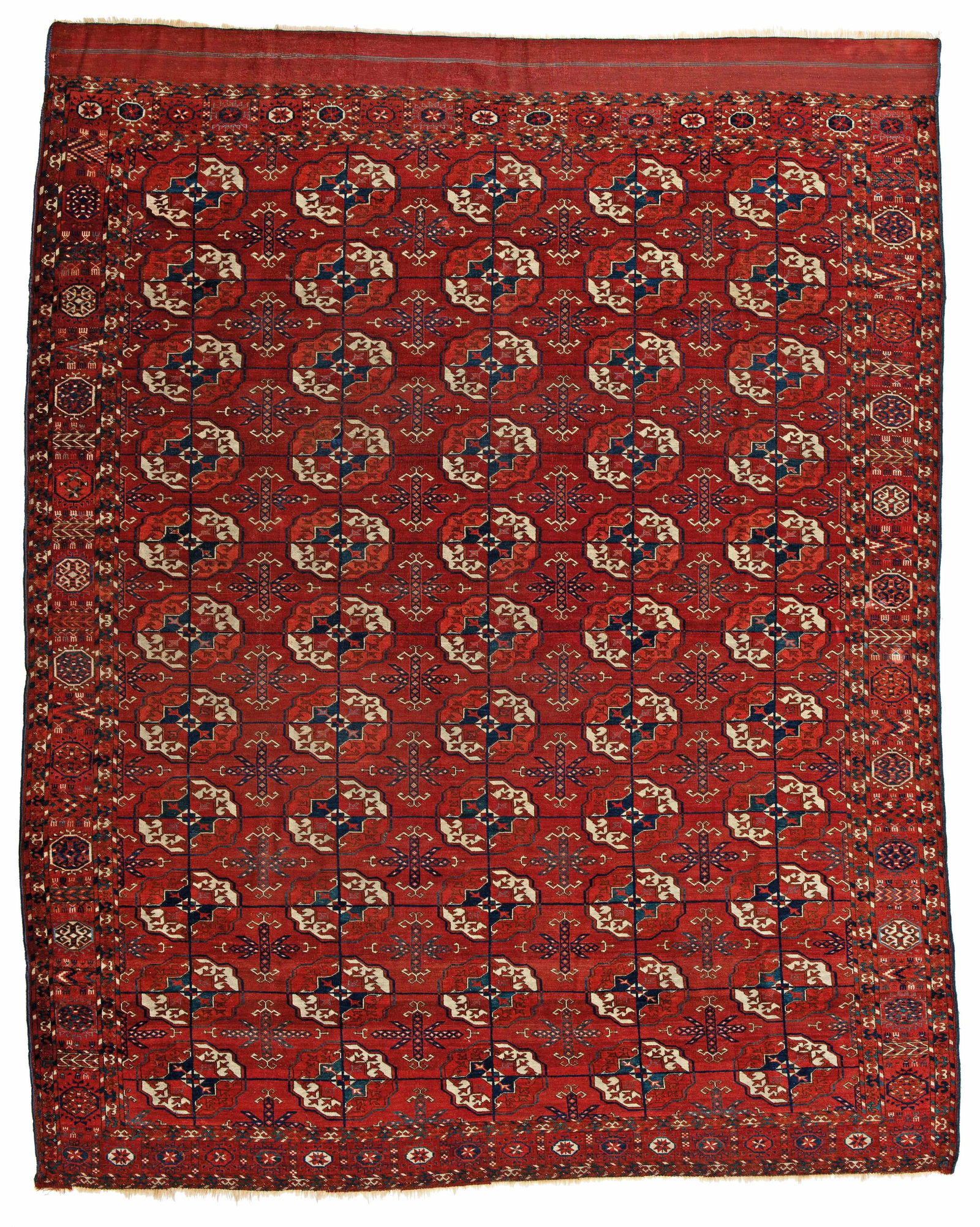 Tekke Main Carpet: Tekke Main Carpet 283 x 218 cm (9' 3" x 7' 2") Turkmenistan, second half 19th century Condition: good, low pile in places, scattered small repairs, lower end slightly incomplete, one repair in the