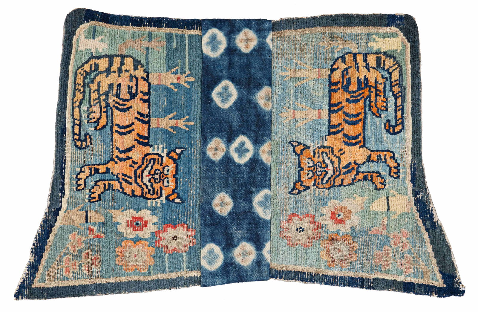 Tibet Saddle Cover with Tigers: Tibet Saddle Cover with Tigers 102 x 60 cm (3' 4" x 2') Tibet, early 20th century Condition: used, low pile, several old repairs, signs of use, backed with fabric Warp: wool, weft: wool, pile: wool