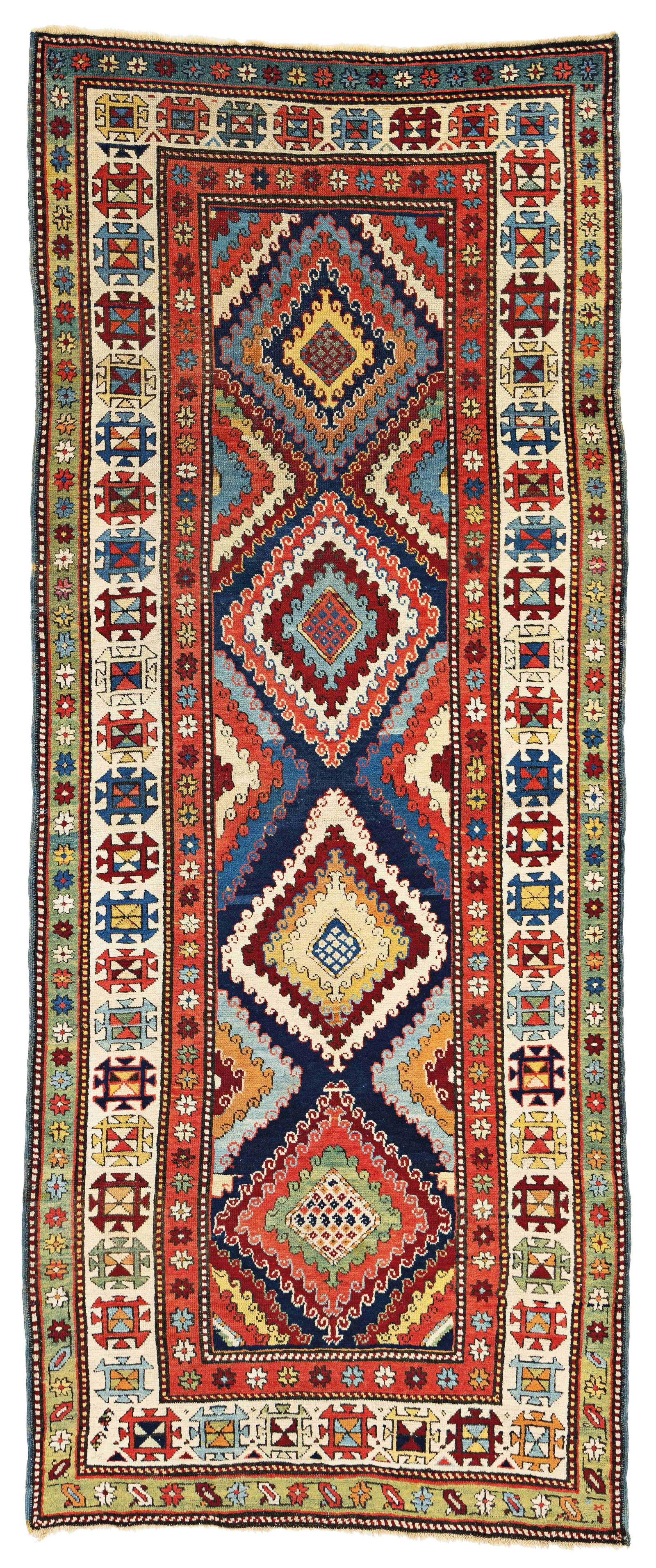 Gendje Rug: Gendje 295 x 119 cm (9' 8" x 3' 11") Caucasus, second half 19th century Condition: good, mostly good pile, scattered small repairs Warp: wool, weft: wool, pile: wool