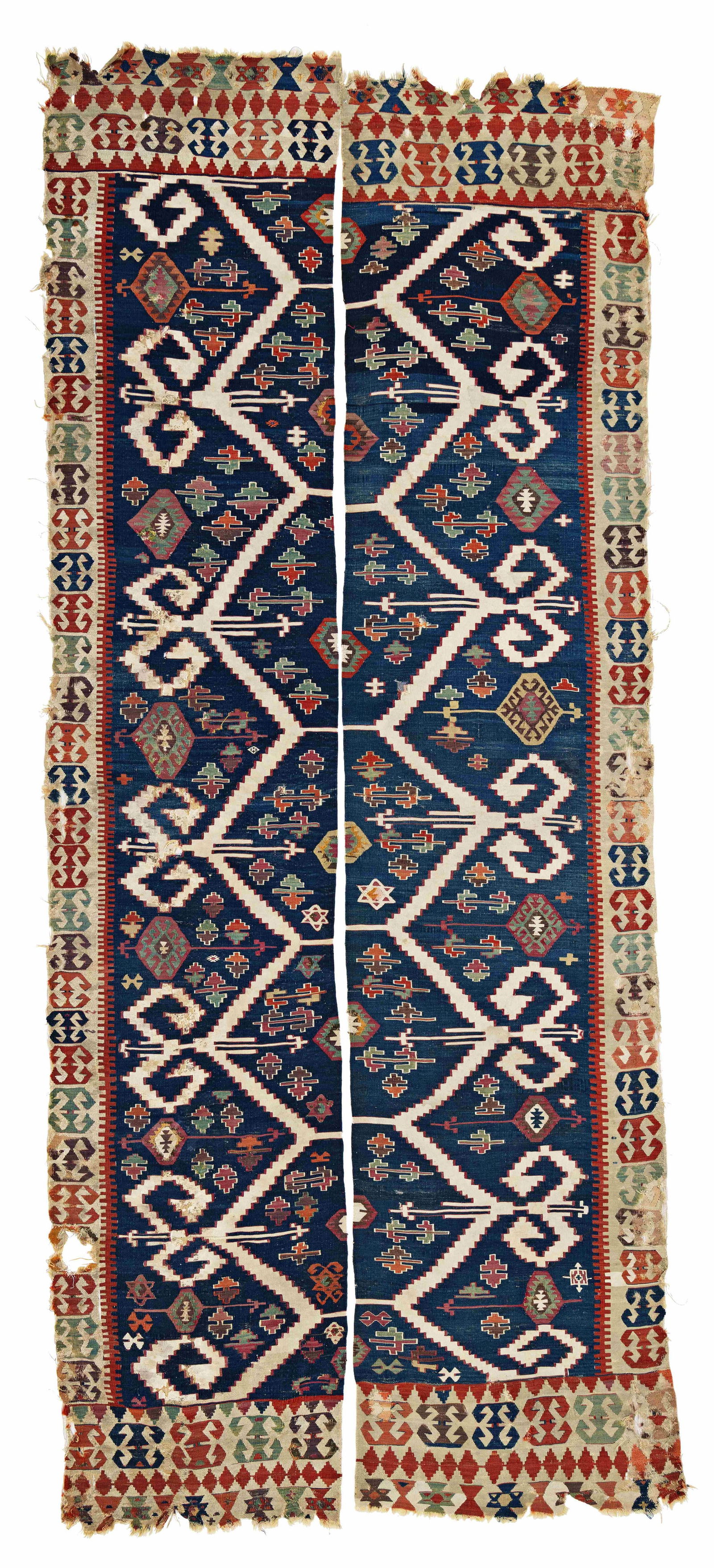 Hotamis Kilim: Hotamis Kilim 350 x 145 cm (11' 6" x 4' 9") Turkey, first half 19th century Condition: used, sides and ends incomplete and damaged, several tears and holes, several repairs, signs of use Warp: wool,