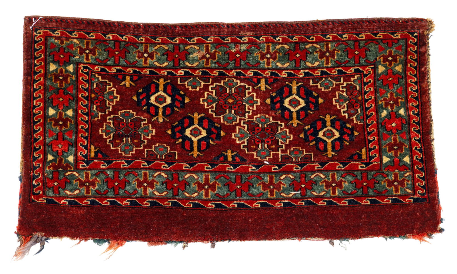 Yomut Mafrash: Yomut Mafrash 80 x 43 cm (2' 7" x 1' 5") Turkmenistan, mid 19th century Condition: good, scattered low pile, original backside remaining, minor small repairs, minor signs of use Warp: wool, weft: