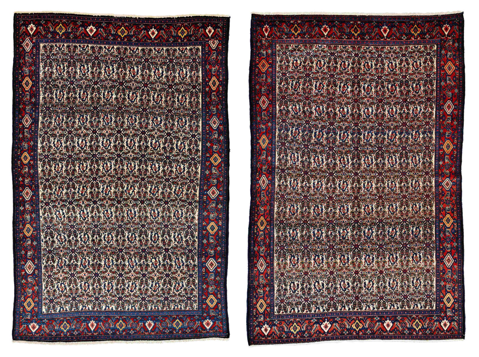A Pair of Senneh Rugs: A Pair of Senneh 196 x 130 cm (6' 5" x 4' 3") each Persia, ca. 1940 Condition: very good, good pile, minor signs of use Warp: cotton, weft: cotton, pile: wool