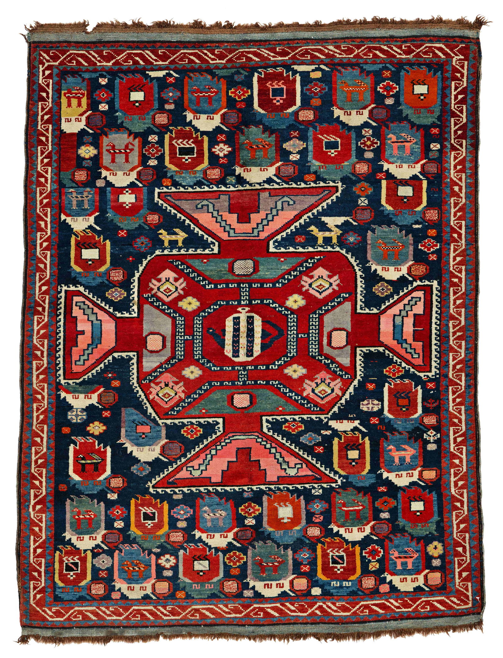 Small Kuba Rug: Small Kuba 124 x 95 cm (4' 1" x 3' 1") Caucasus, ca. 1900 Condition: very good, full pile, signs of use at sides and ends Warp: wool, weft: cotton, pile: wool