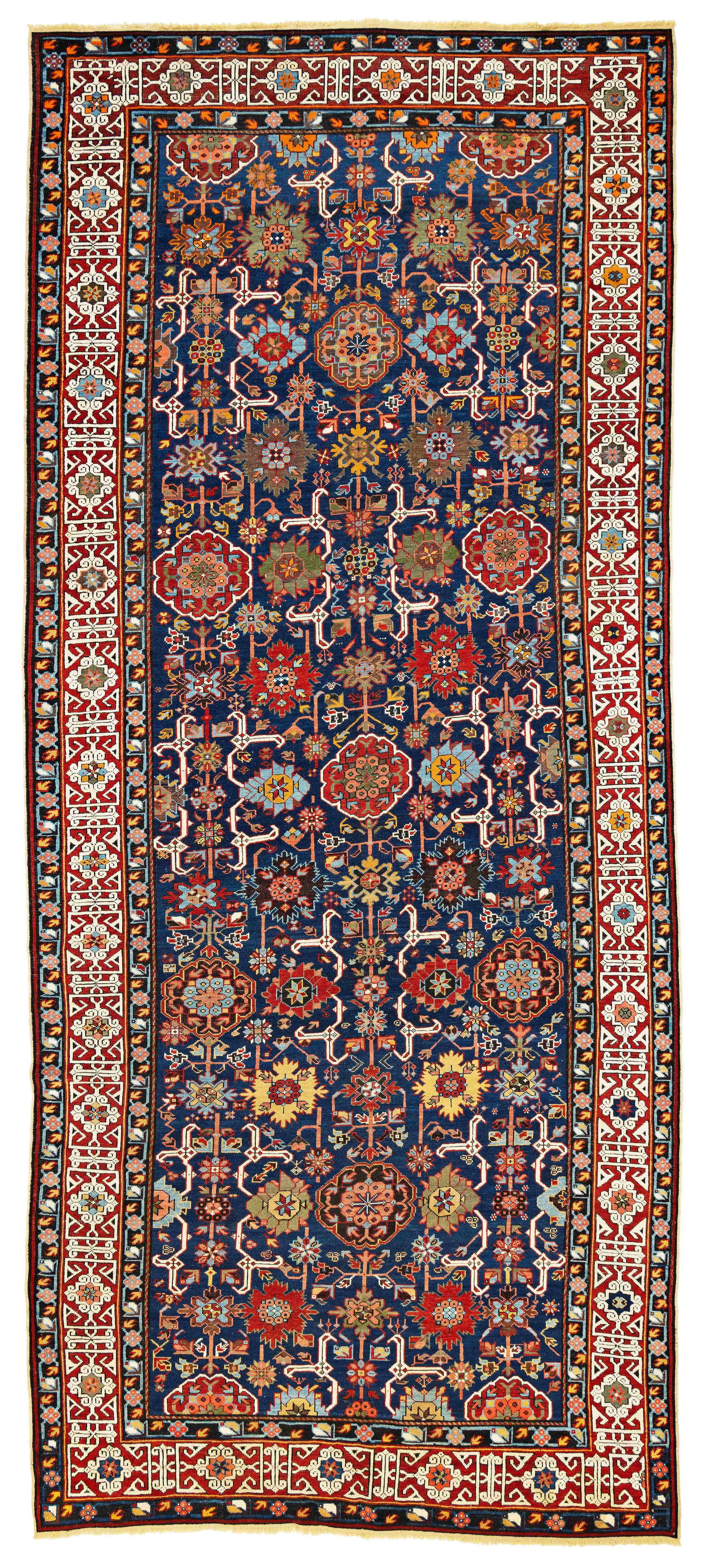 Large Fork-Leaf Kuba Carpet: Large Fork-Leaf Kuba 440 x 192 cm (14' 5" x 6' 4") Caucasus, late 19th century Condition: good, mostly good pile, corroded dark brown, both ends slightly restored, scattered small repairs Warp: wool,