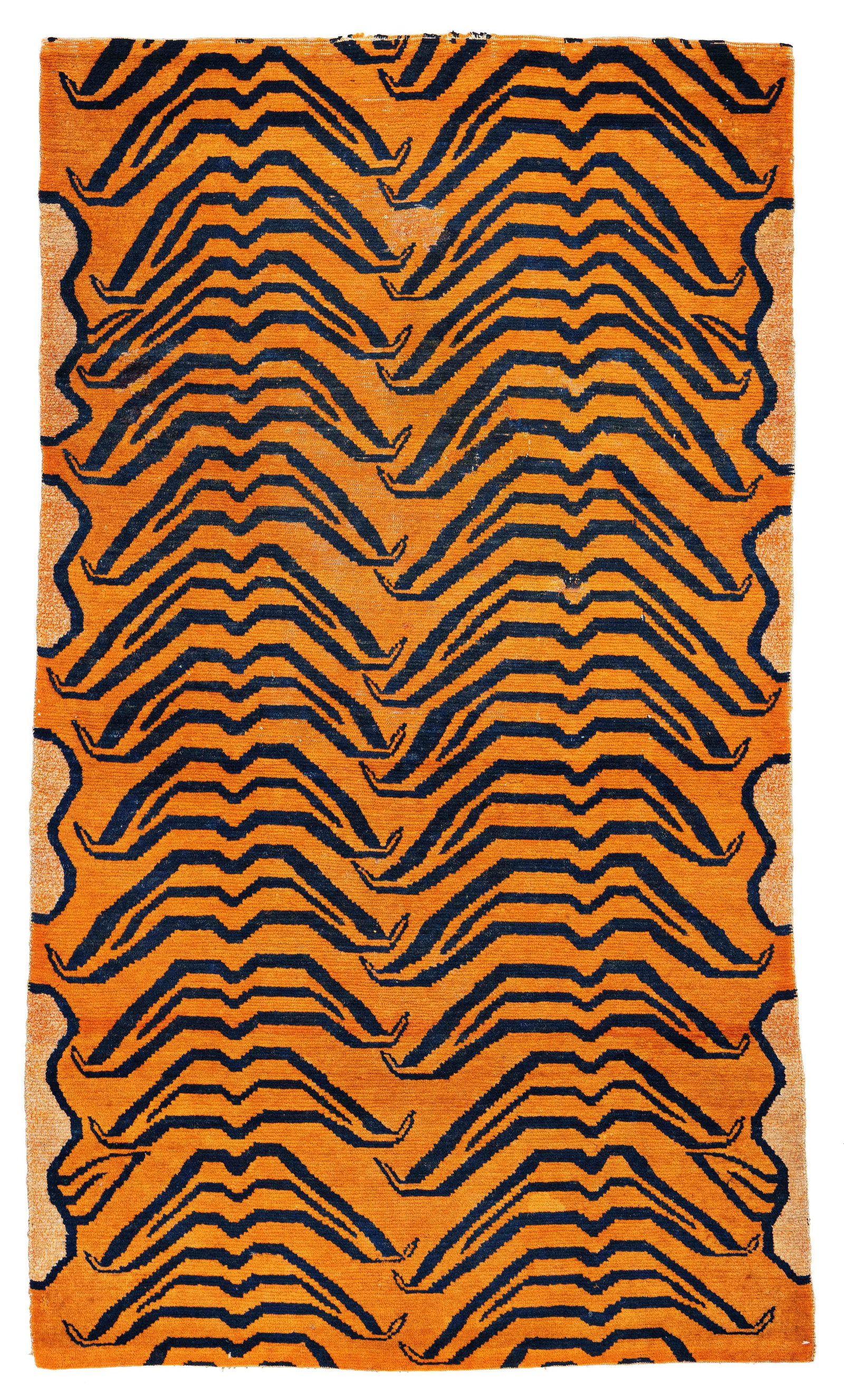 Tibet Tiger Rug: Tibet Tiger Rug 154 x 89 cm (5' 1" x 2' 11") Tibet, early 20th century Condition: good, low pile in places, scattered small repairs, slight signs of use Warp: wool, weft: wool, pile: wool Depictions