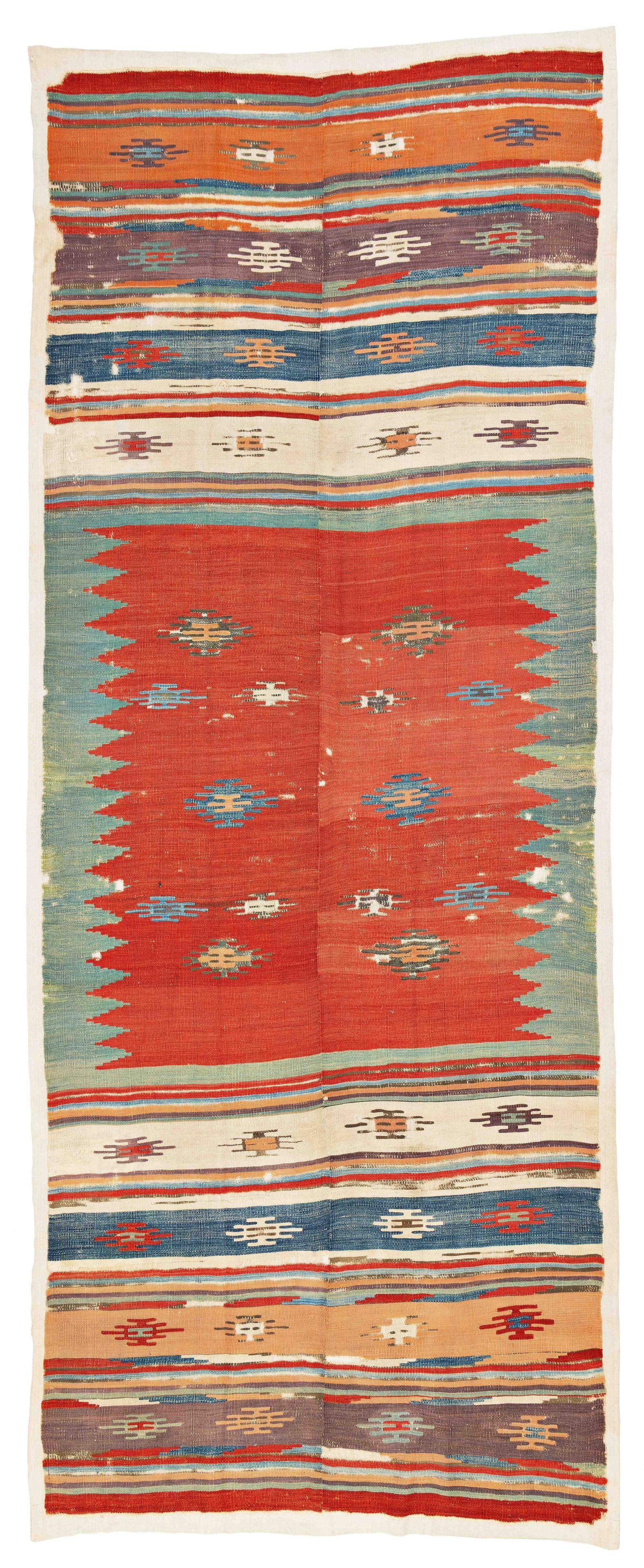Early Sivas Kilim: Early Sivas Kilim 380 x 145 cm (12' 6" x 4' 9") Turkey, mid 18th century Condition: according to age, partially corroded brown, sides and ends partially damaged, several small holes, signs of use, sew