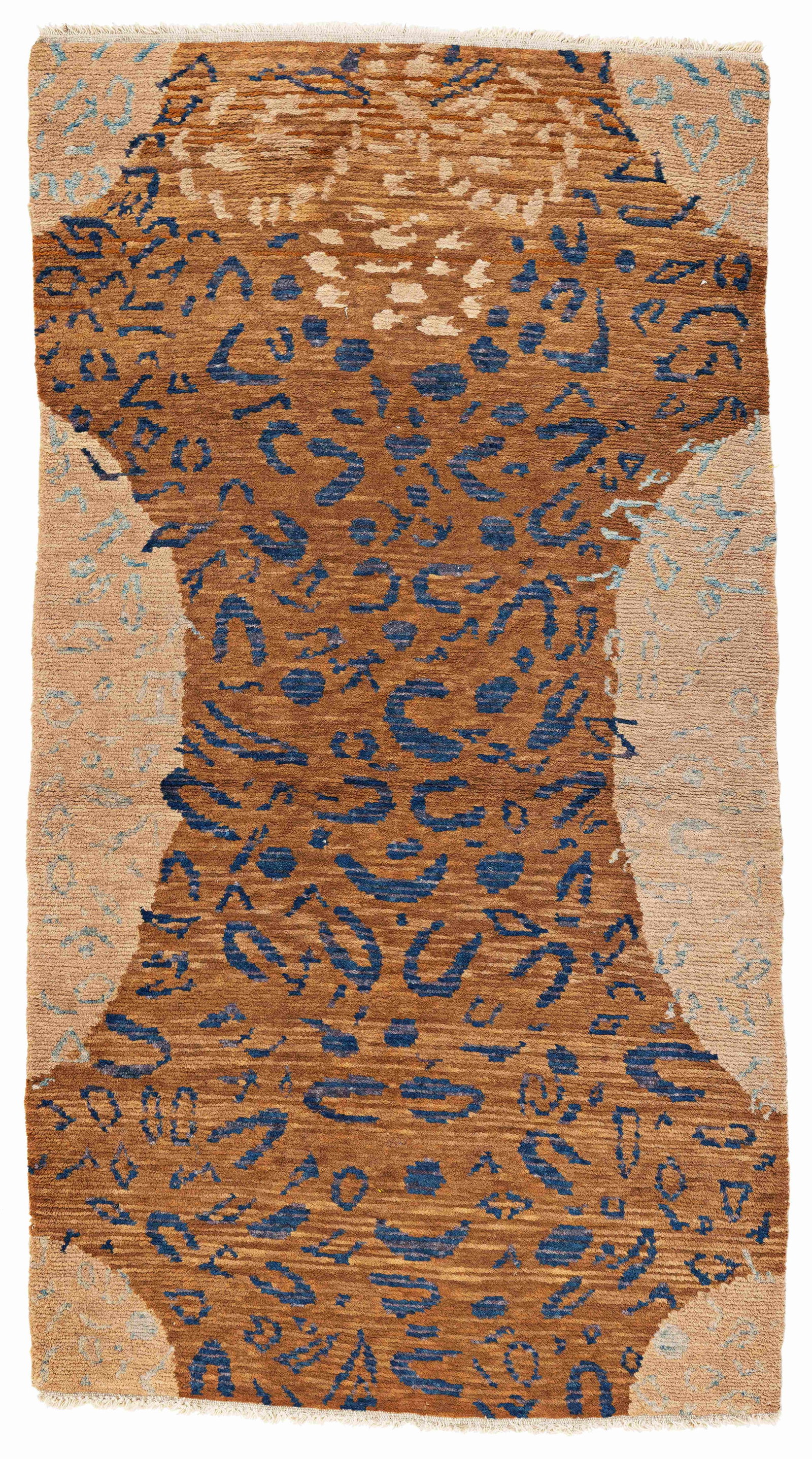 Tibet Tiger Rug: Tibet Tiger Rug 179 x 93 cm (5' 10" x 3' 1") Tibet, early 20th century Condition: very good, good pile, adhesive residue on the back side, minor signs of use Warp: wool, weft: wool, pile: wool