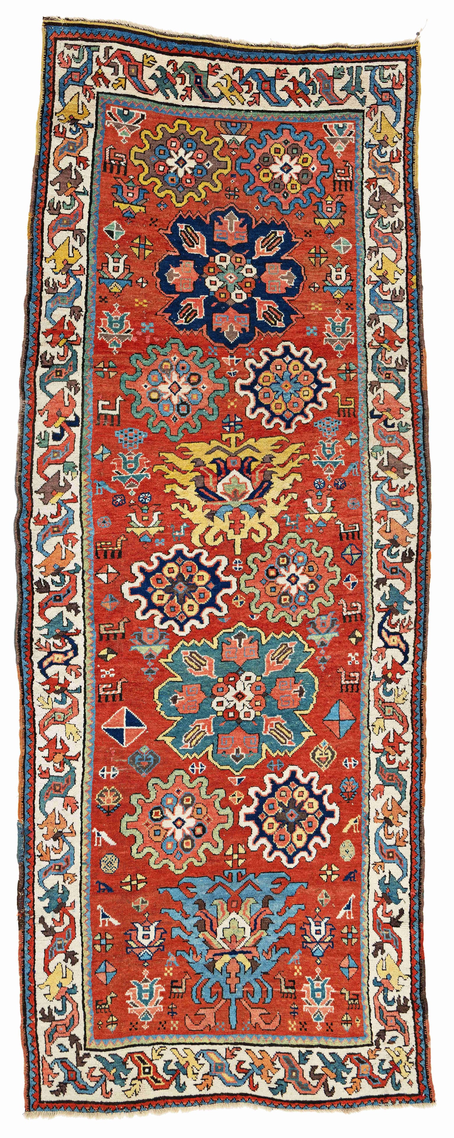 Transcaucasian Rug with Palmettes: Transcaucasian Rug with Palmettes 295 x 115 cm (9' 8" x 3' 9") Caucasus, early 19th century Condition: very good for its age, mostly good pile, scattered small repairs, lower end slightly incomplete
