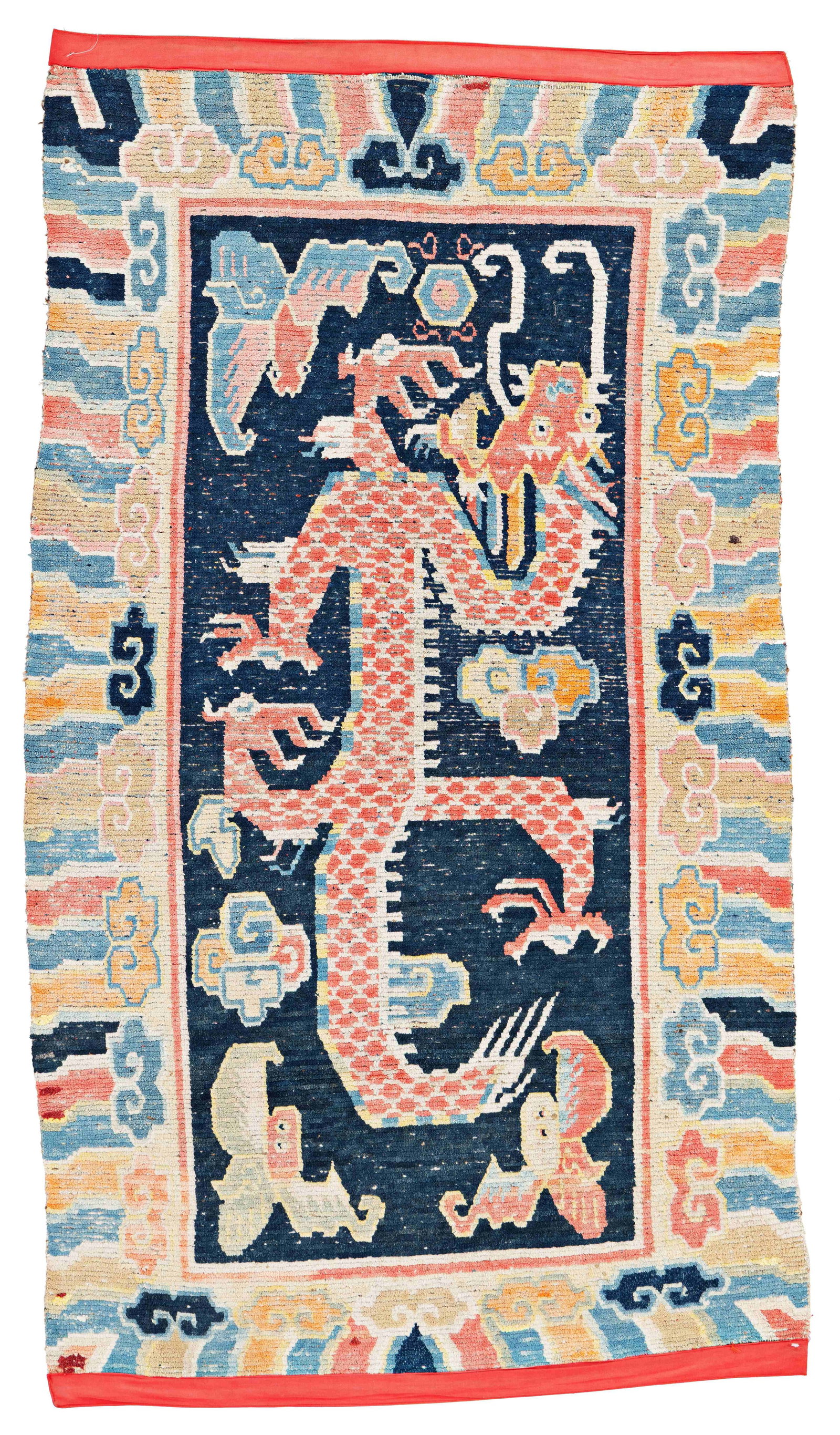 Tibet Khaden Rug: Tibet Khaden 148 x 86 cm (4' 10" x 2' 10") Tibet, early 20th century Condition: used, low pile, several small repairs, ends edged in fabric Warp: wool, weft: wool, pile: wool