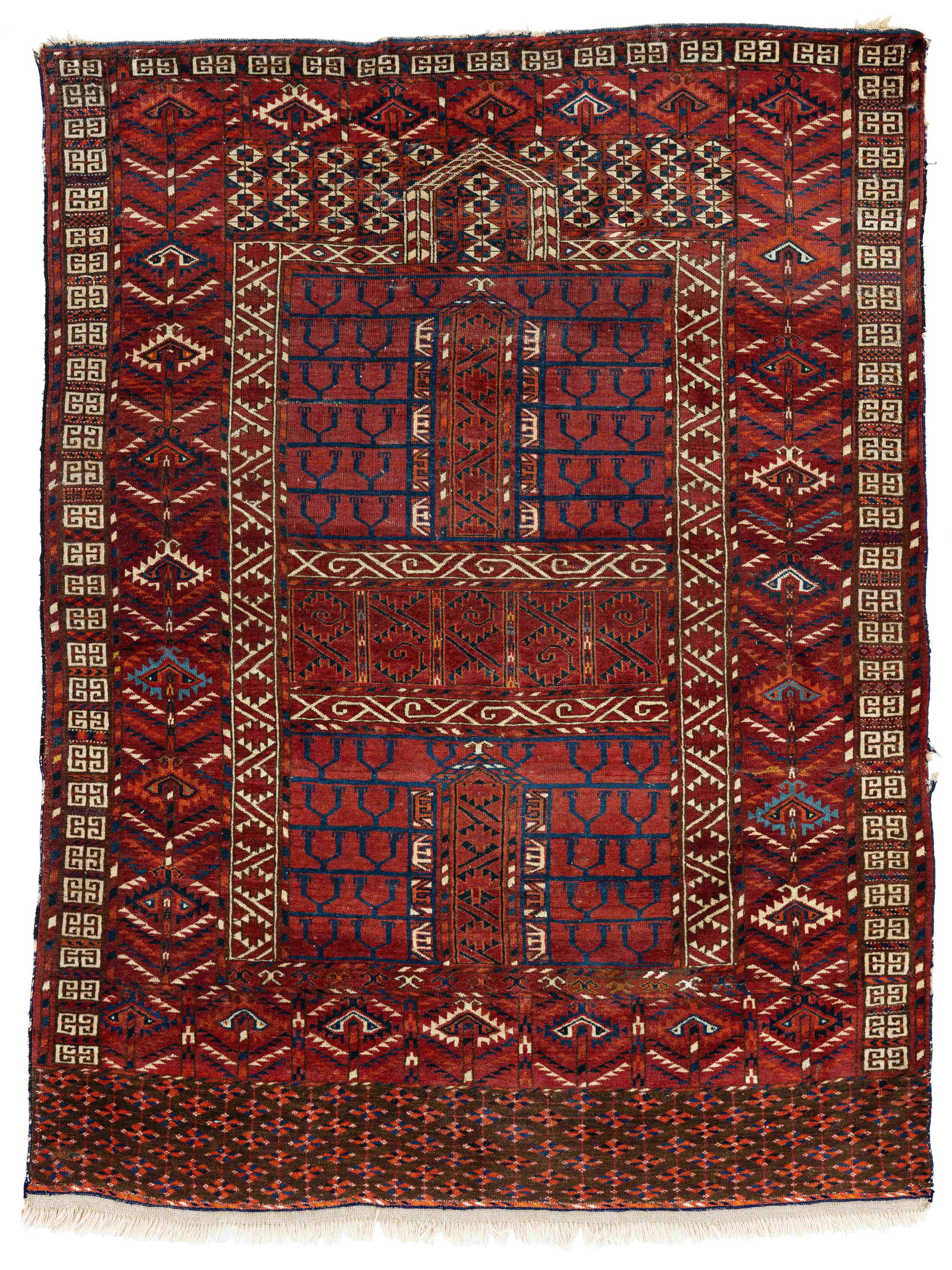 Tekke Ensi Rug: Tekke Ensi 160 x 121 cm (5' 3" x 4') Turkmenistan, second half 19th century Condition: good, low pile in places, lower end slightly restored, sides and upper end partially damaged, scattered small
