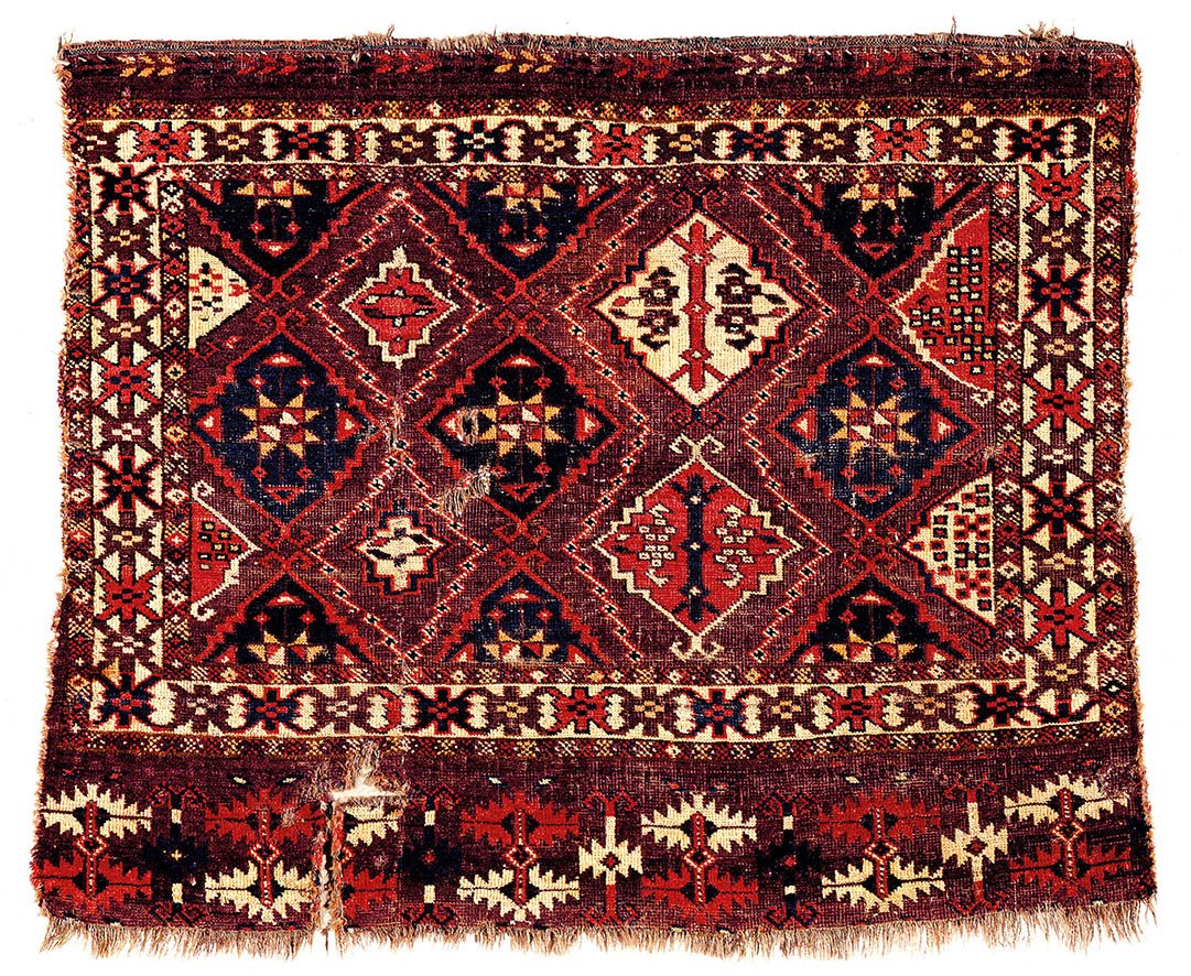 Chodor Chuval Fragment: Chodor Chuval Fragment, Turkmenistan 2nd quarter 19th century, 2ft. 09in. x 3ft. 4in. 84 x 102 cm Condition: vertically cut and resewn, reduced by approximately 4in., a few small holes including one p