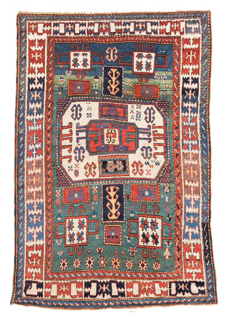Karachoph Kazak: 225 x 154 cm (7ft. 5in. x 5ft. 1in.) Caucasus 1860 Condition: both ends partly rewoven, very few small repairs Wool warp, wool weft, wool pile
