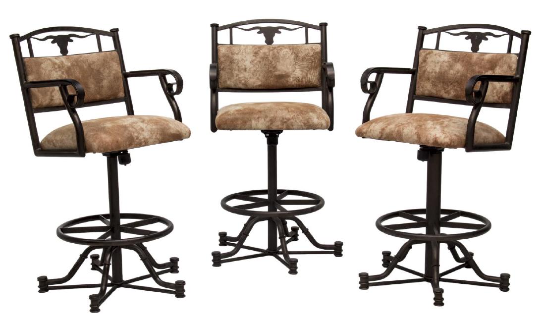 (3) LONGHORN STATIONARY SWIVEL METAL BAR CHAIRS: (set of 3) Stationary swivel metal bar stools, Tempo Industries, having cut out longhorn design to back rest, upholstered back and seat in suede like fabric, scrolled open arms, rising on five-support