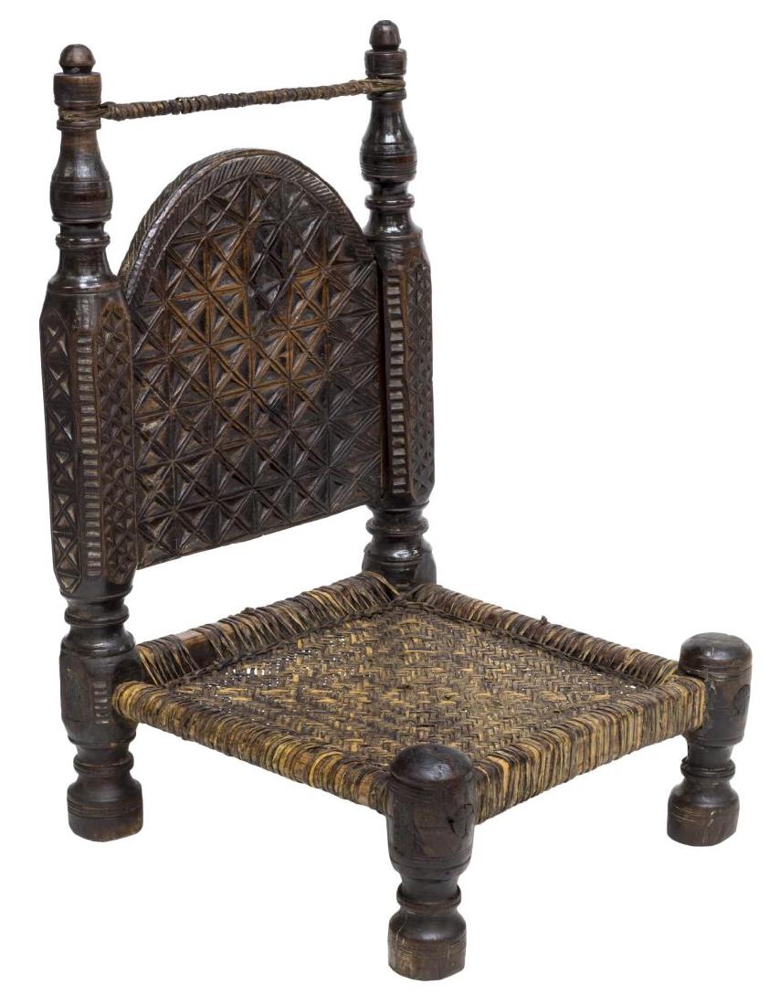 INDIAN CARVED LOW CHAIR WITH WOVEN SEAT (1 of 3)