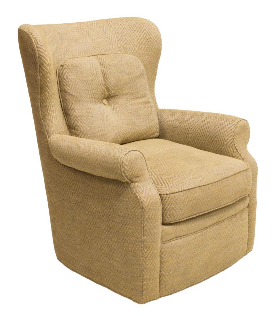 UPHOLSTERED SWIVEL ROCKING CHAIR, JESSICA CHARLES: Upholstered swivel "Brookwood" rocking chair, by Jessica Charles, the cushioned wingback issuing a pillow form back cushion, removable seat cushion, scrolling armrests, hidden swivel rocking base, 38"