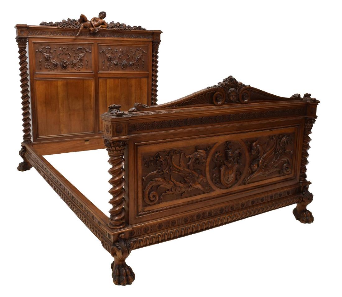 CONTINENTAL RENNAISSANCE REVIVAL FIGURAL BED: Continental Renaissance Revival carved bed, a reclined female nude, surmounting floral festoons and ribbon in relief, well defined spiral columns to either side rise on heavy carved paw feet, conformi